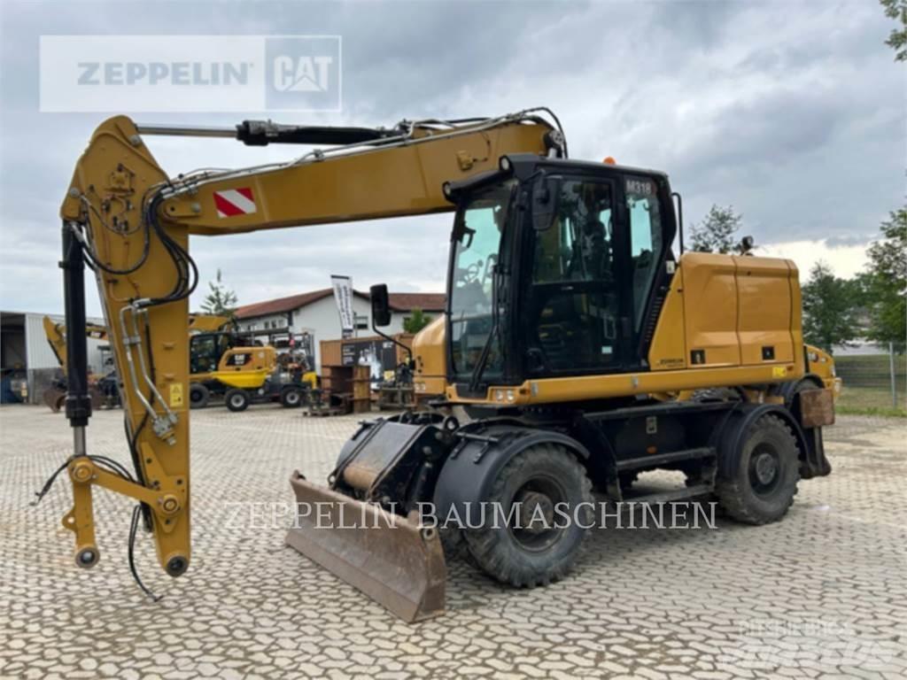 CAT M318-07A حفارات بعجل