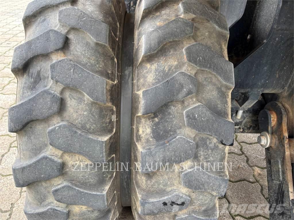 CAT M318-07A حفارات بعجل