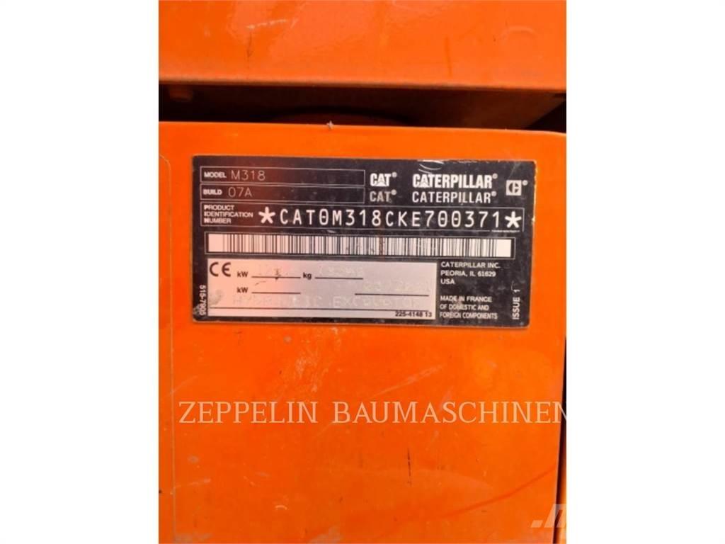 CAT M318-07A حفارات بعجل