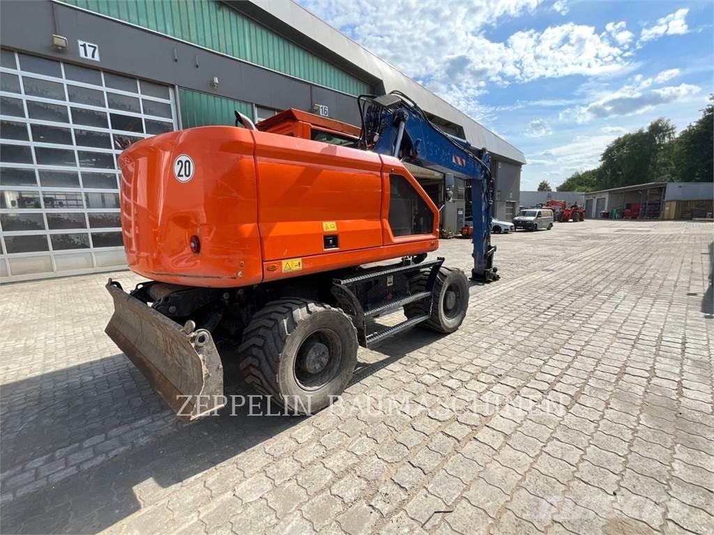 CAT M318-07A حفارات بعجل