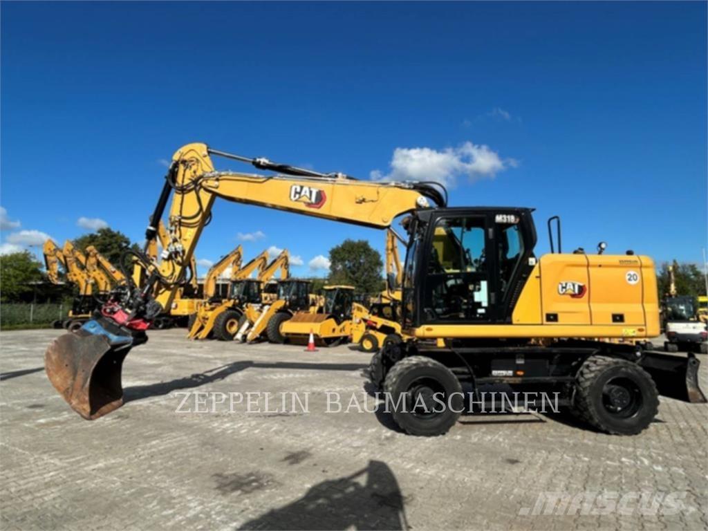 CAT M318-07A حفارات بعجل