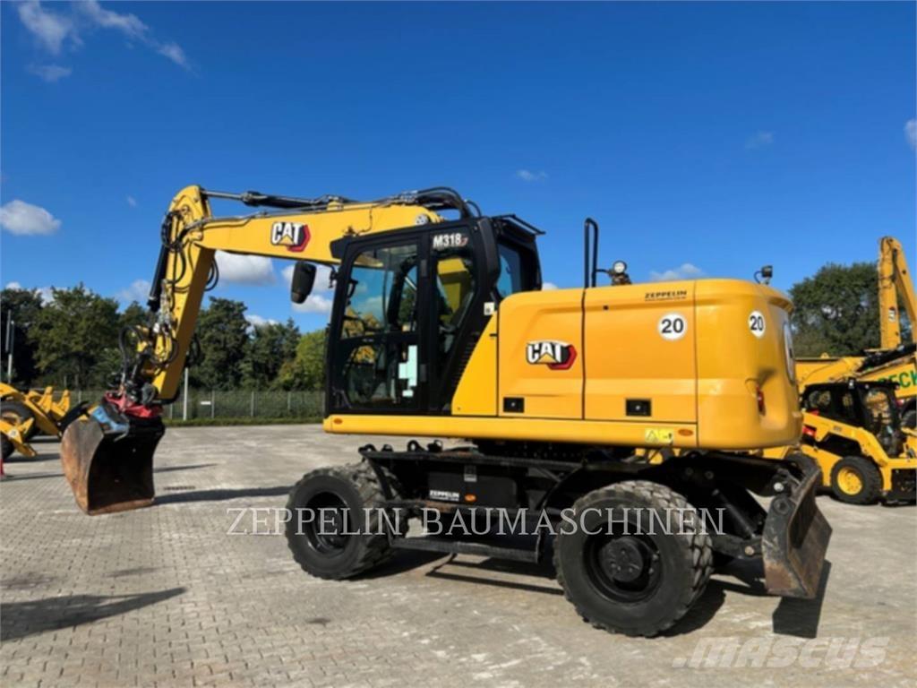 CAT M318-07A حفارات بعجل