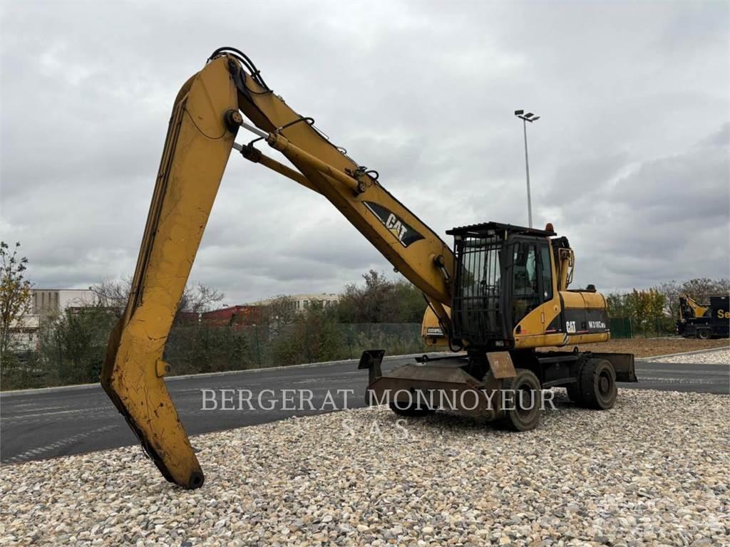 CAT M318C حفارات بعجل