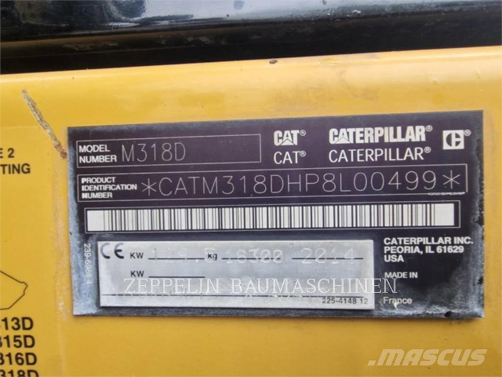 CAT M318D حفارات بعجل