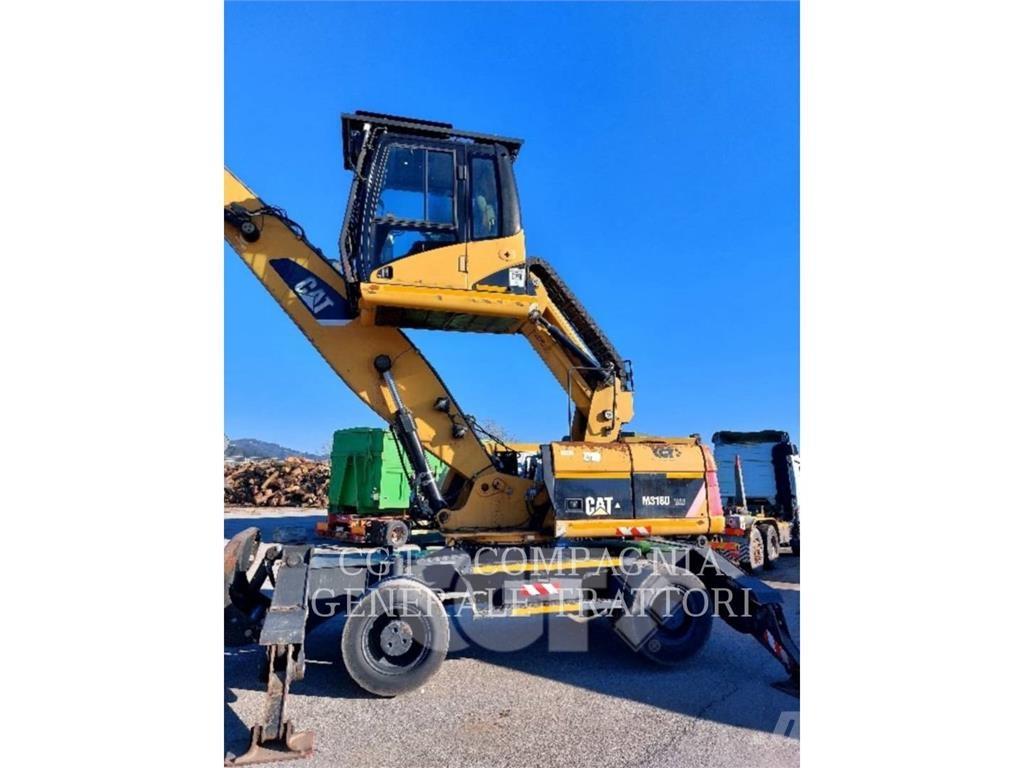 CAT M318D MH حفارات بعجل