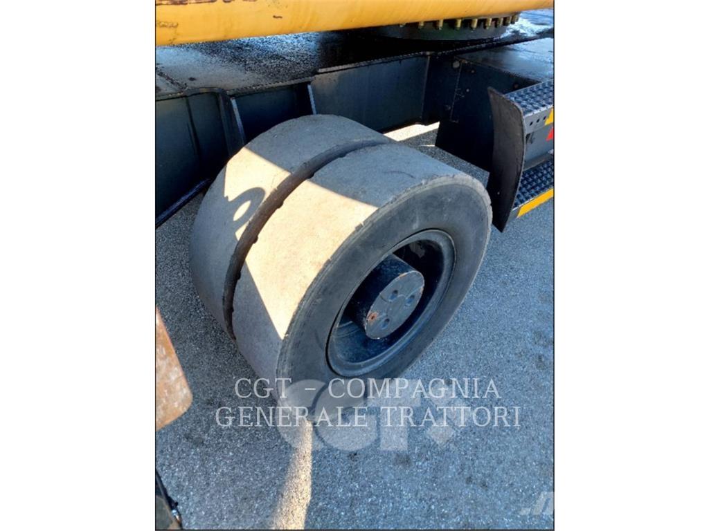 CAT M318D MH حفارات بعجل