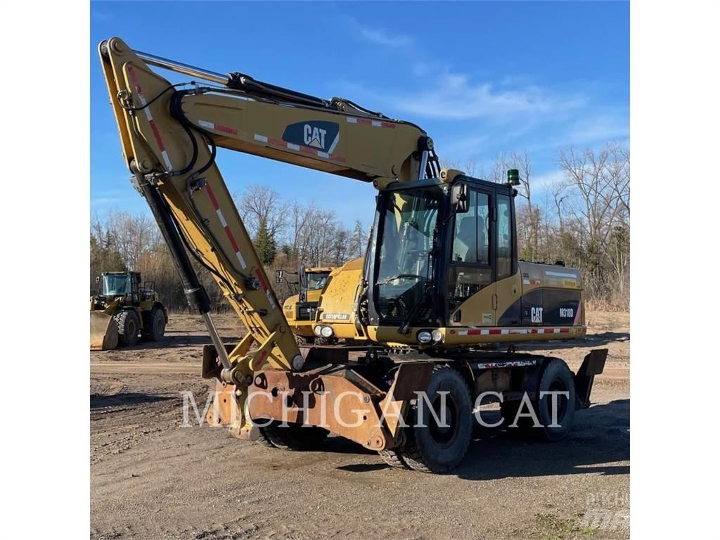CAT M318D PM حفارات بعجل