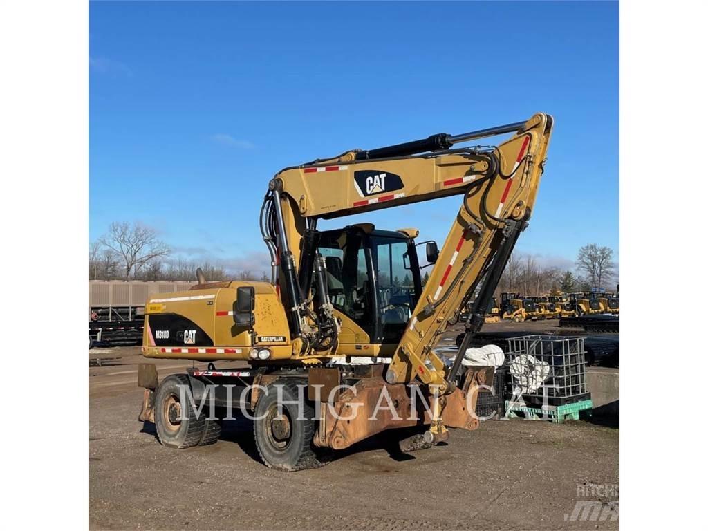 CAT M318D PM حفارات بعجل