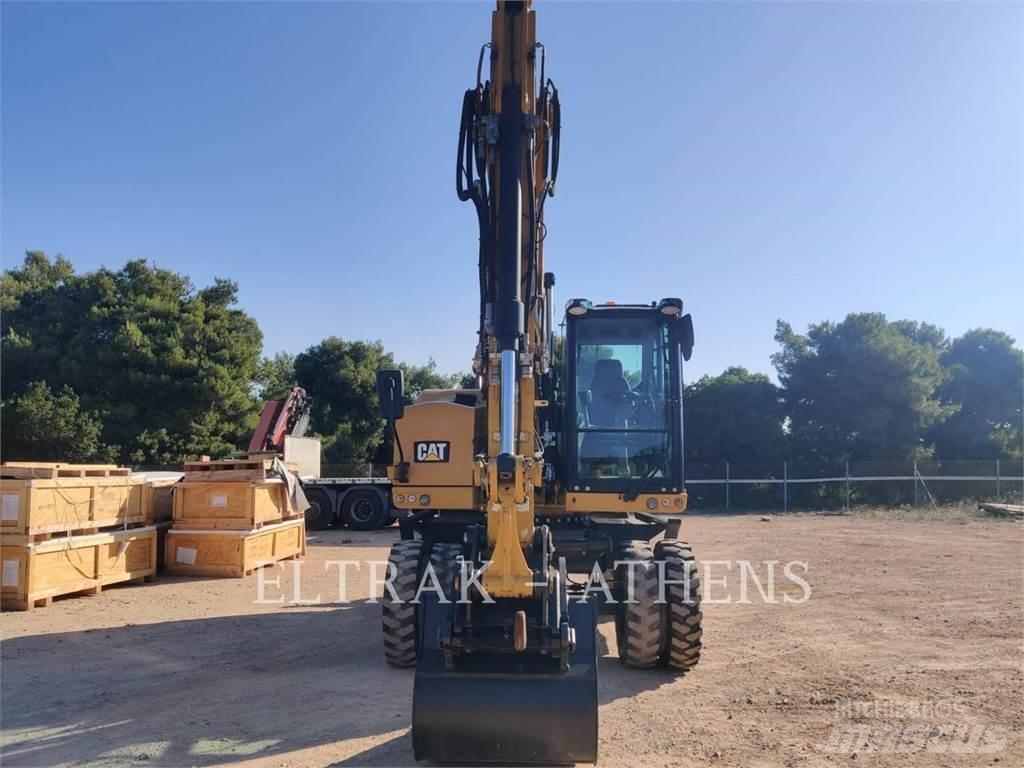 CAT M318F حفارات بعجل