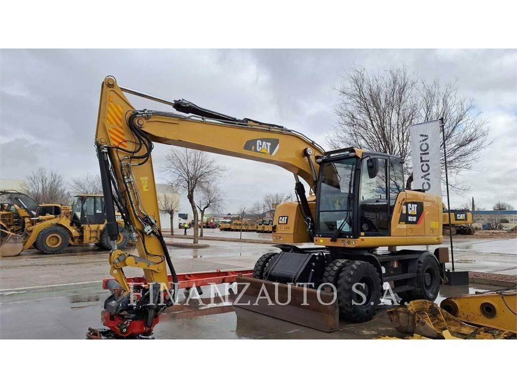 CAT M318F حفارات بعجل