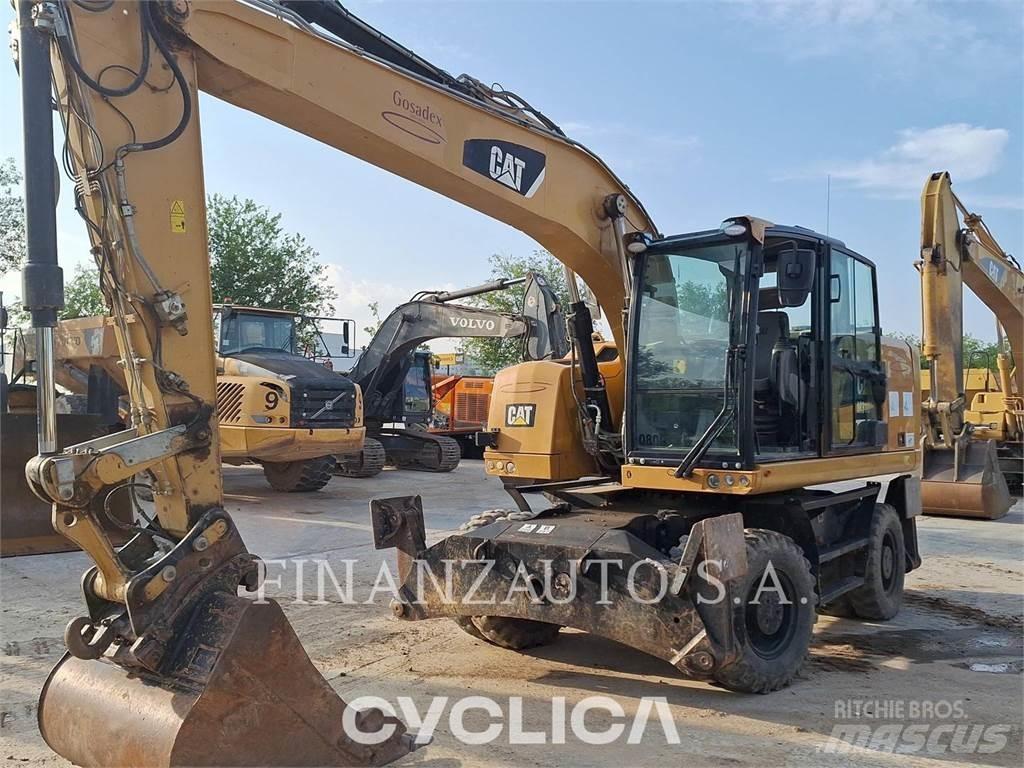 CAT M318F حفارات بعجل