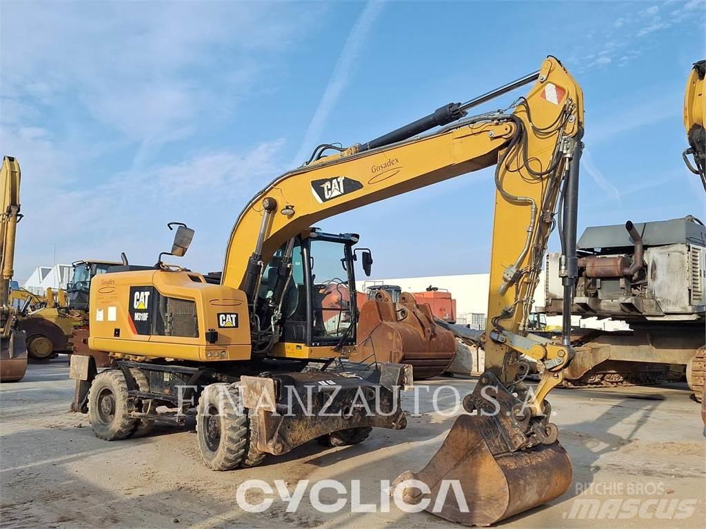 CAT M318F حفارات بعجل