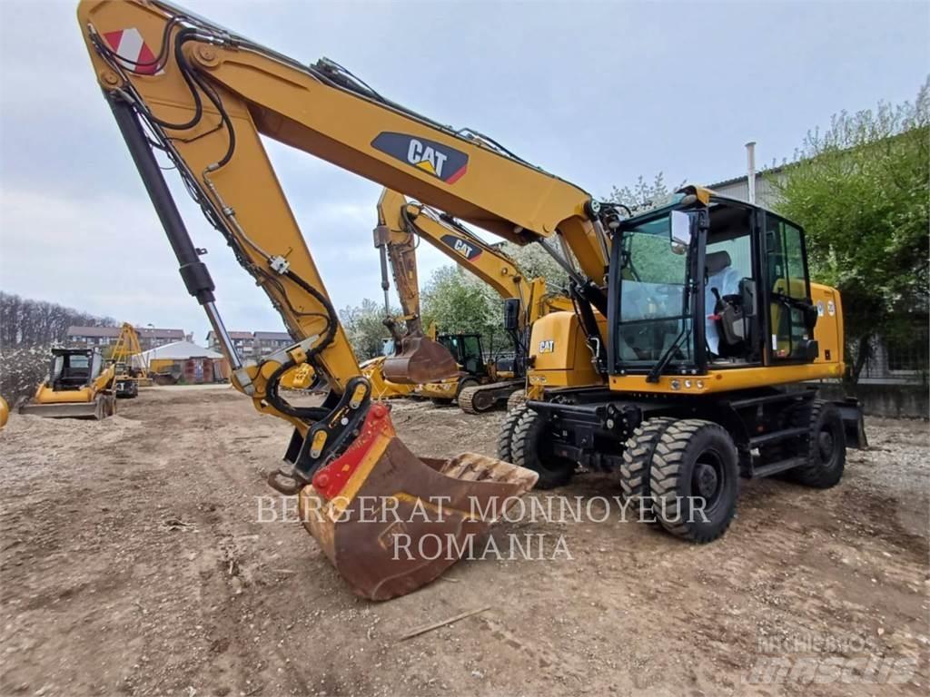 CAT M318F حفارات بعجل