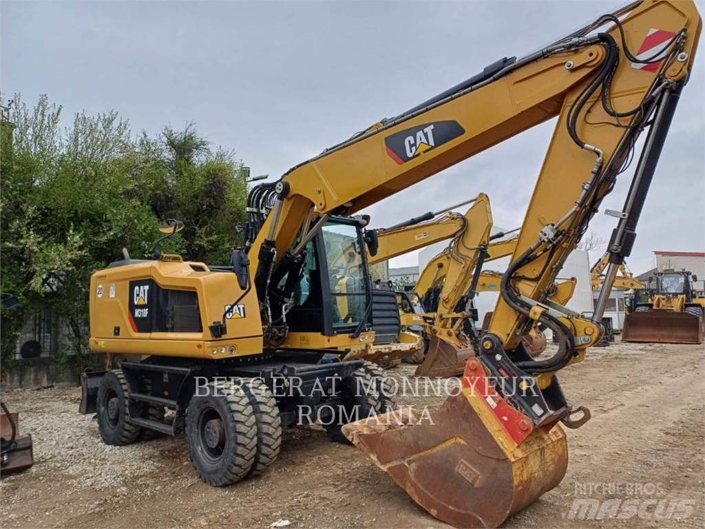 CAT M318F حفارات بعجل