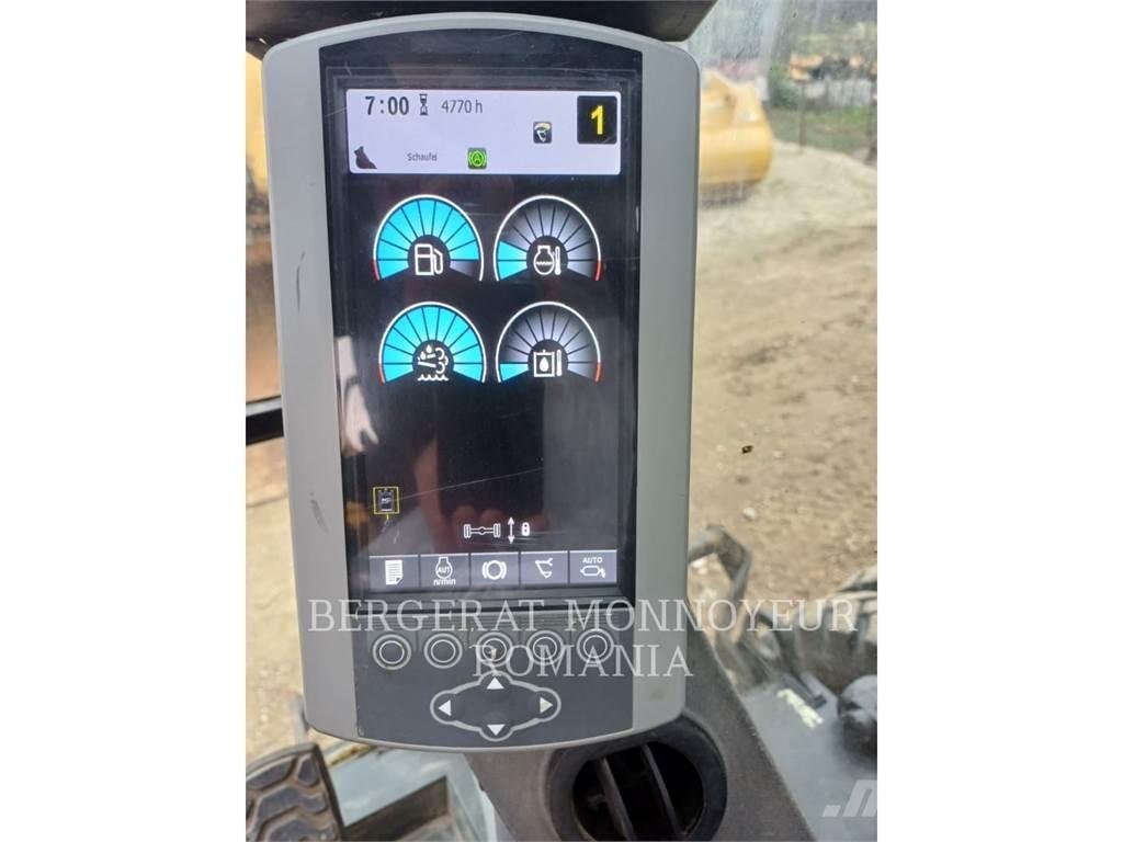 CAT M318F حفارات بعجل