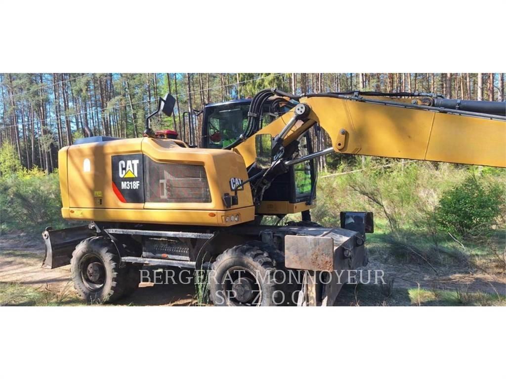 CAT M318F حفارات بعجل