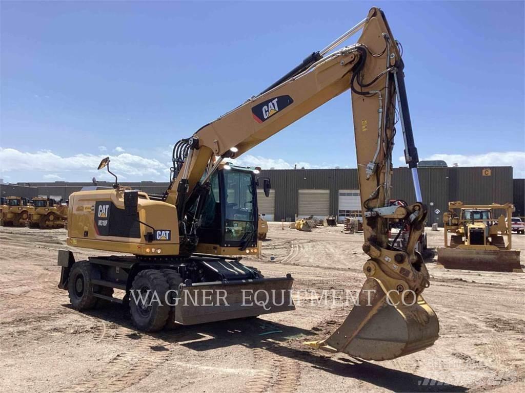 CAT M318F حفارات بعجل