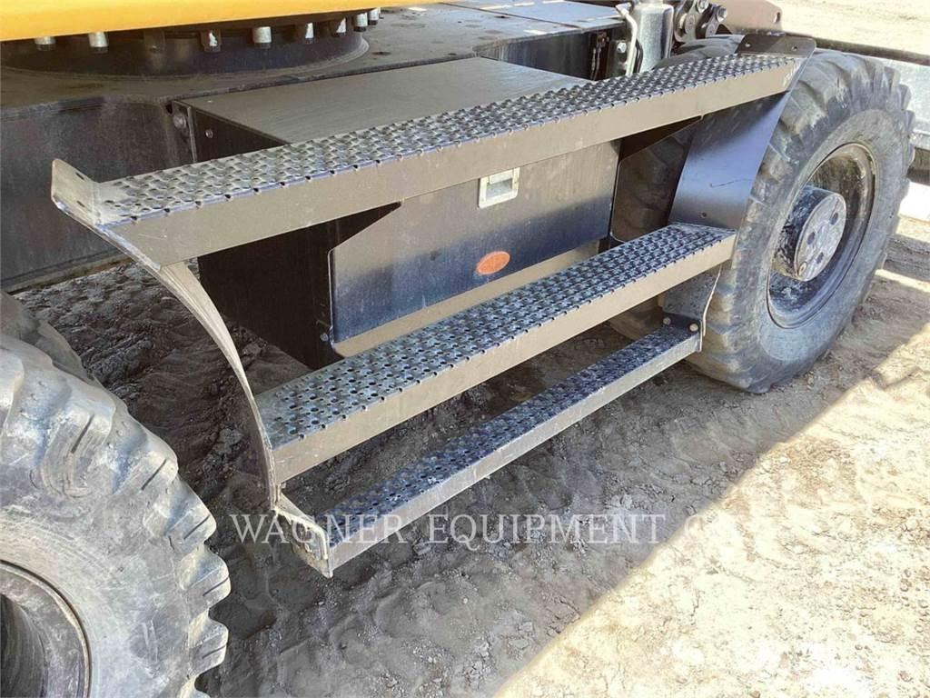 CAT M318F حفارات بعجل