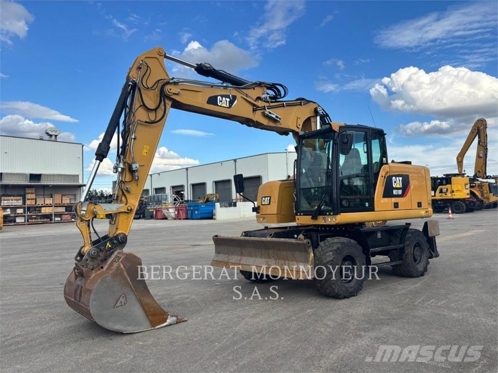 CAT M318F IVC حفارات بعجل