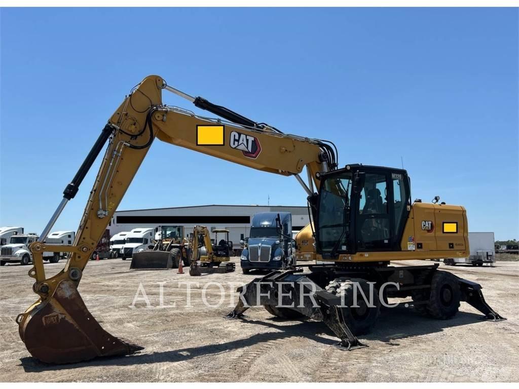 CAT M320 حفارات بعجل