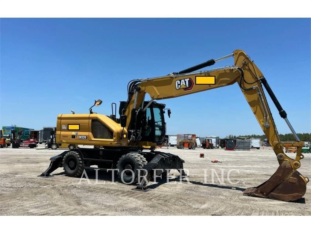 CAT M320 حفارات بعجل