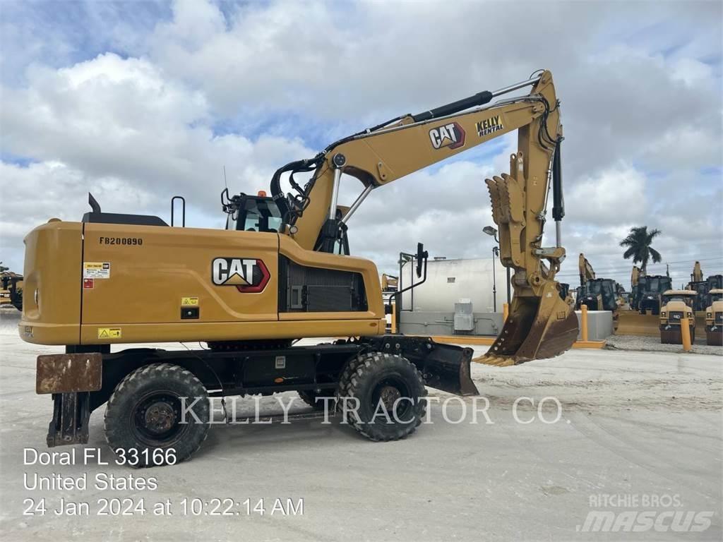 CAT M320 F حفارات بعجل