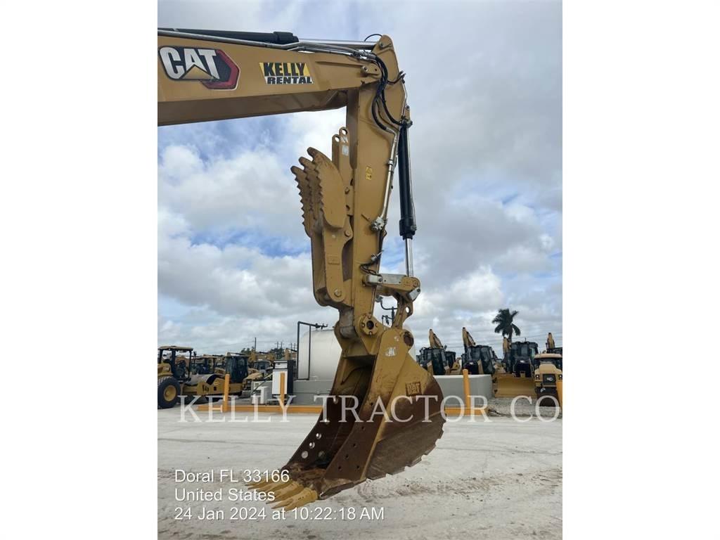 CAT M320 F حفارات بعجل