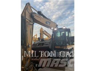 CAT M320F حفارات بعجل