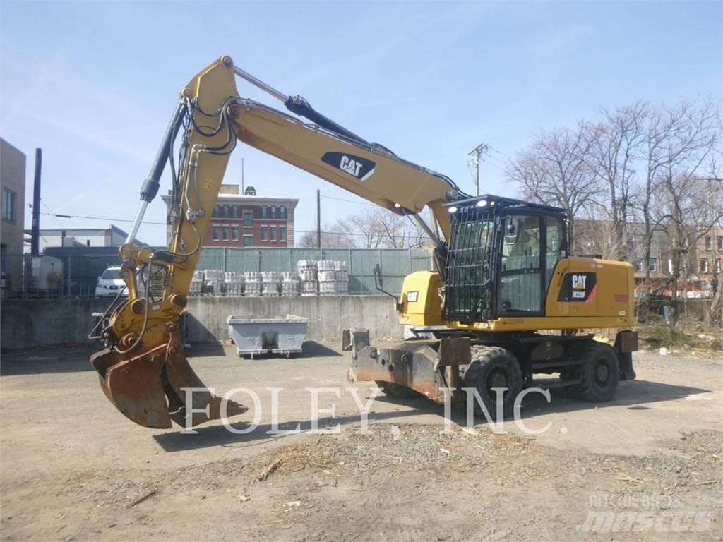 CAT M320F حفارات بعجل