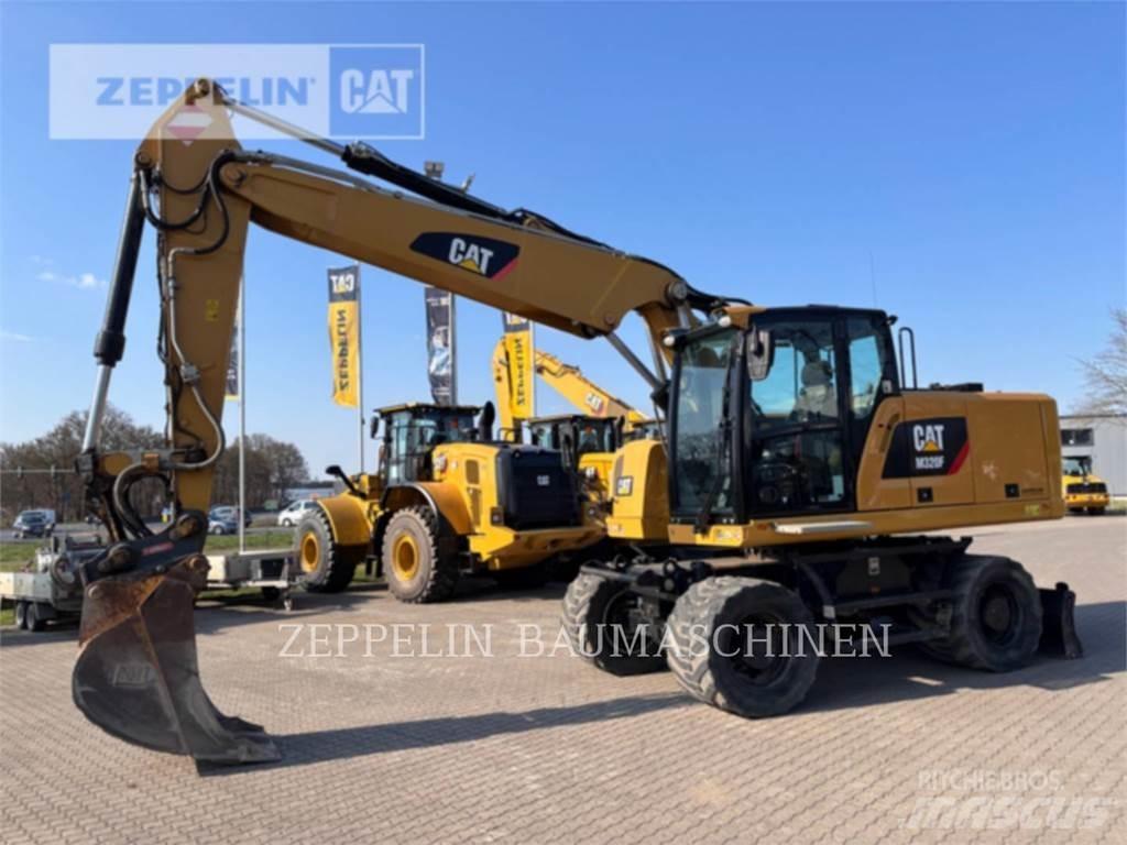 CAT M320F حفارات بعجل