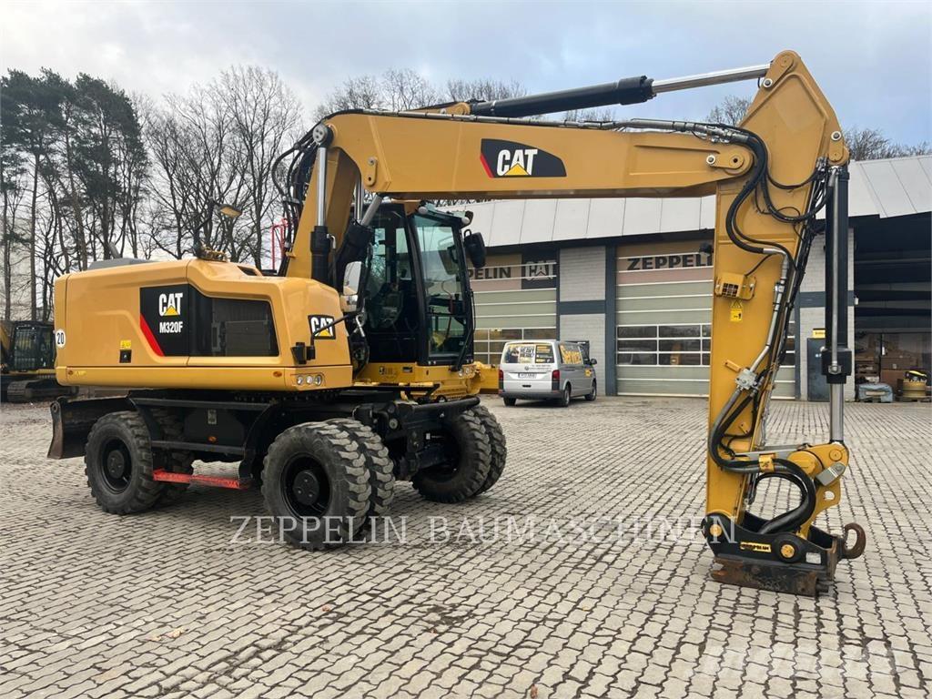 CAT M320F حفارات بعجل