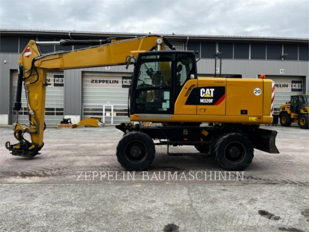 CAT M320F حفارات بعجل