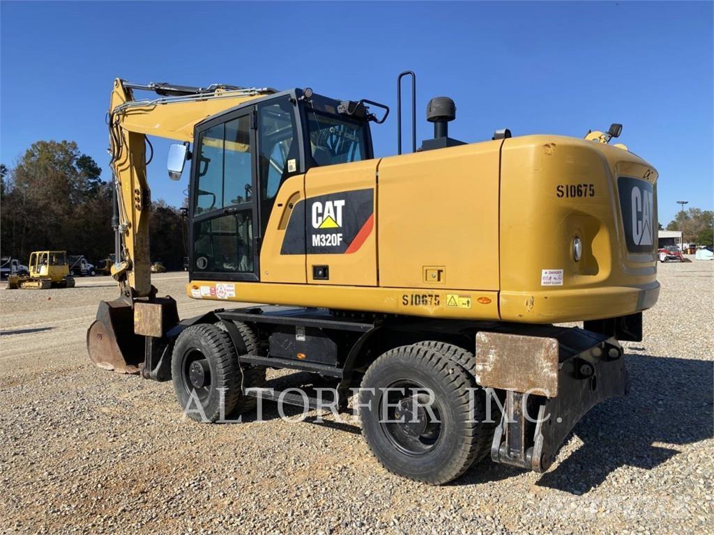 CAT M320F حفارات بعجل