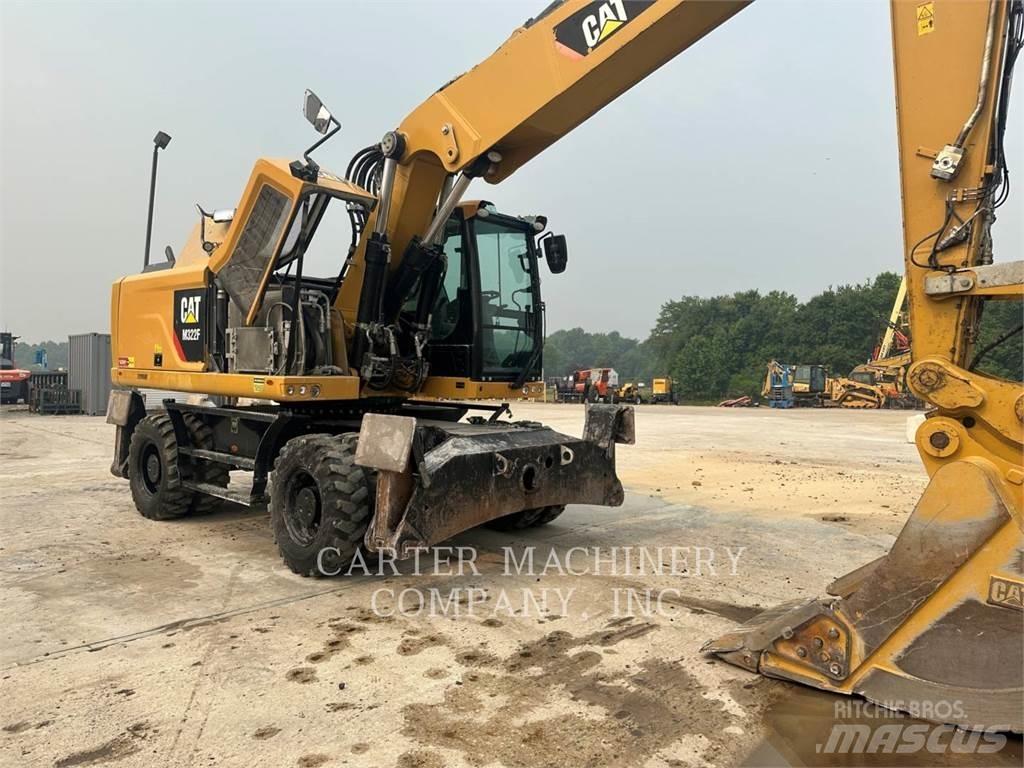 CAT M322F حفارات بعجل