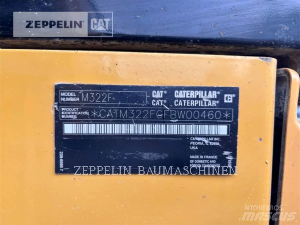 CAT M322F حفارات بعجل