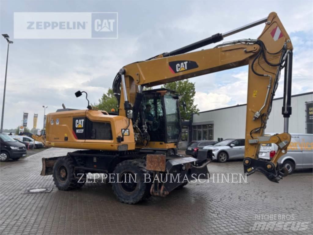 CAT M322F حفارات بعجل
