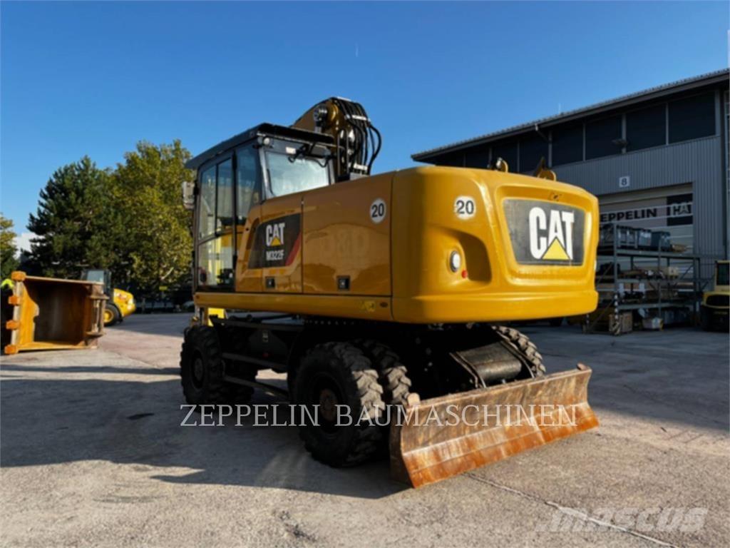 CAT M322F حفارات بعجل