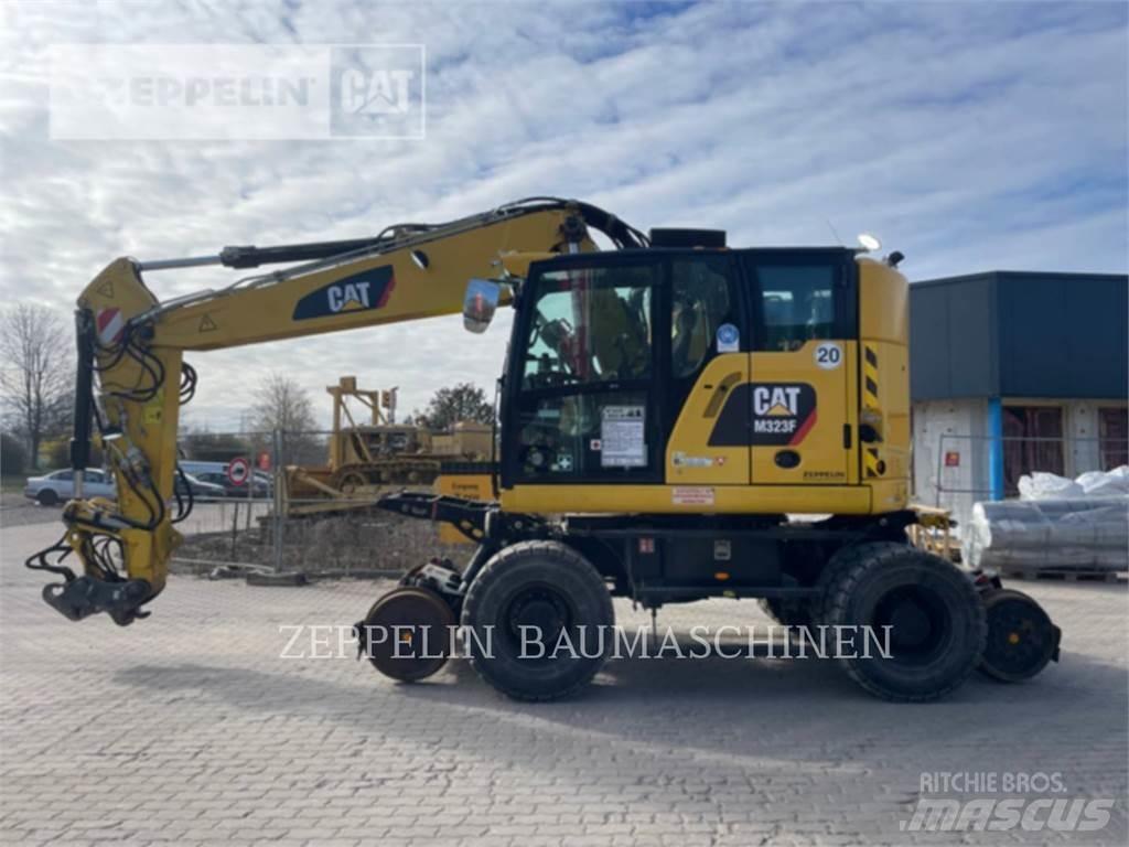 CAT M323F حفارات بعجل
