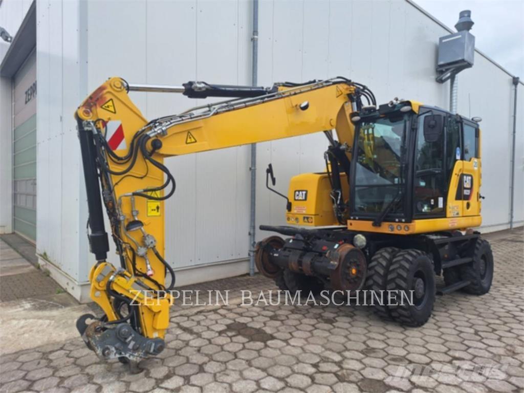 CAT M323F حفارات بعجل