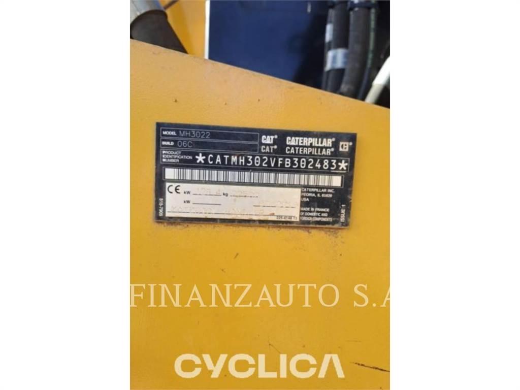 CAT MH3022 حفارات بعجل