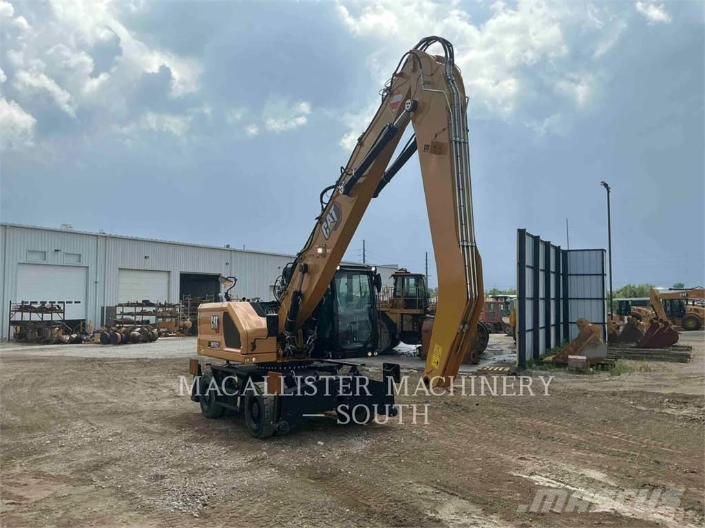 CAT MH3022 حفارات بعجل