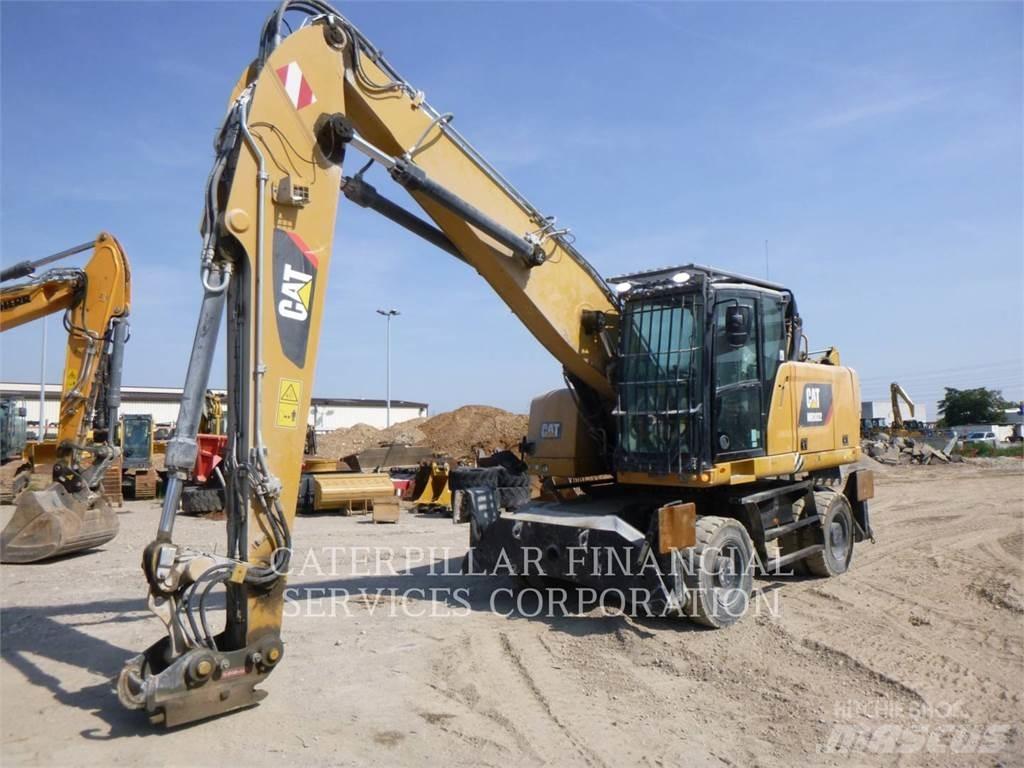 CAT MH3022-06 حفارات بعجل