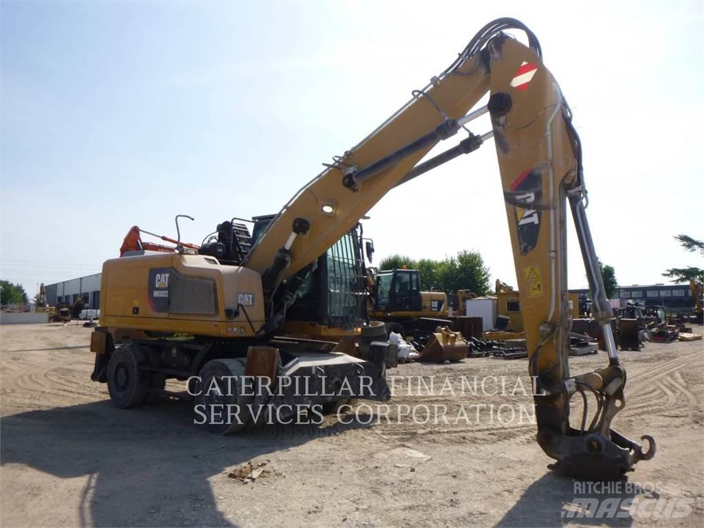 CAT MH3022-06 حفارات بعجل