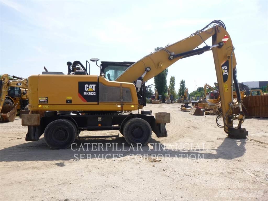 CAT MH3022-06 حفارات بعجل