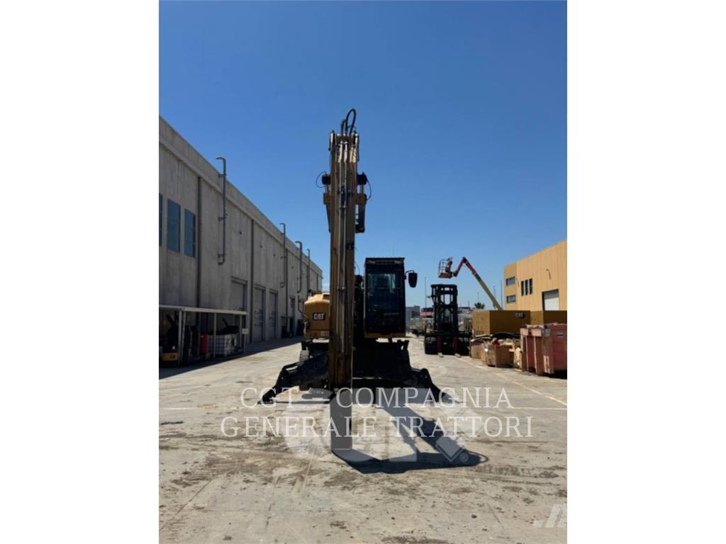 CAT MH3024 حفارات بعجل