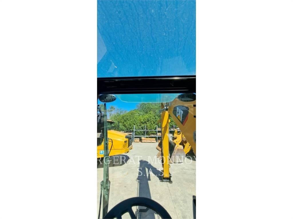 CAT MH3024-06 حفارات بعجل
