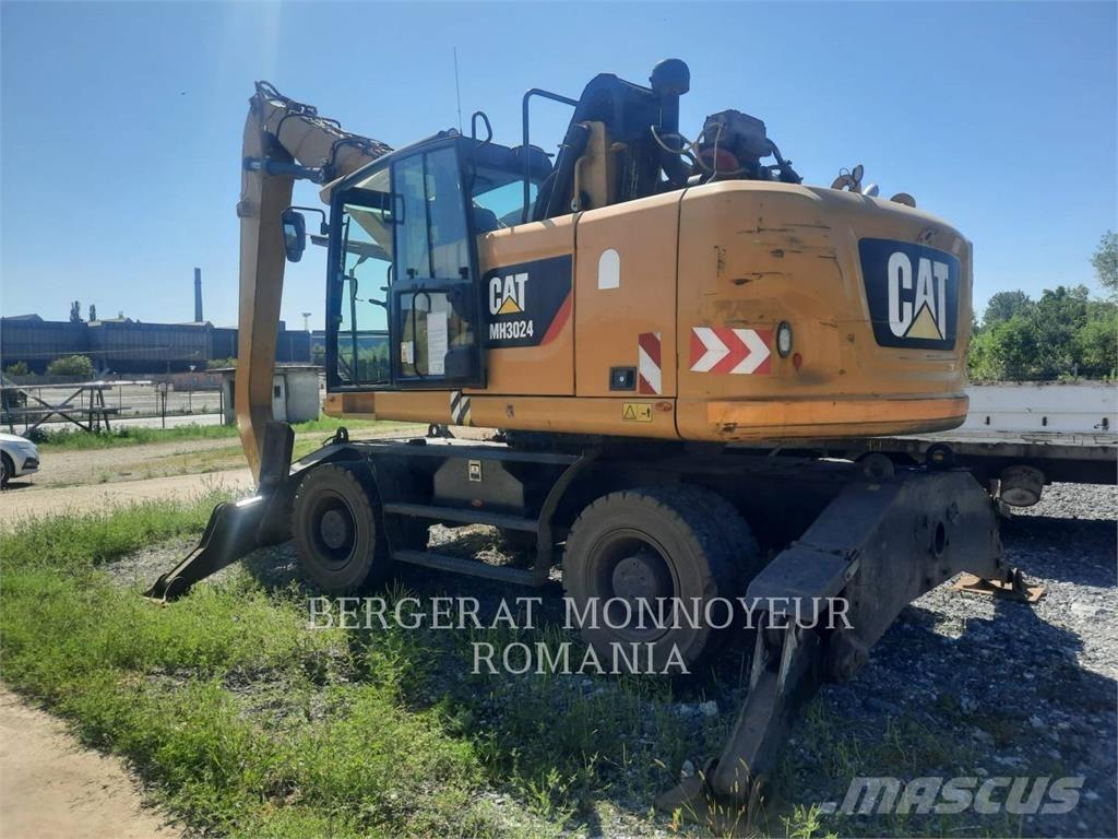 CAT MH3024-06 حفارات بعجل