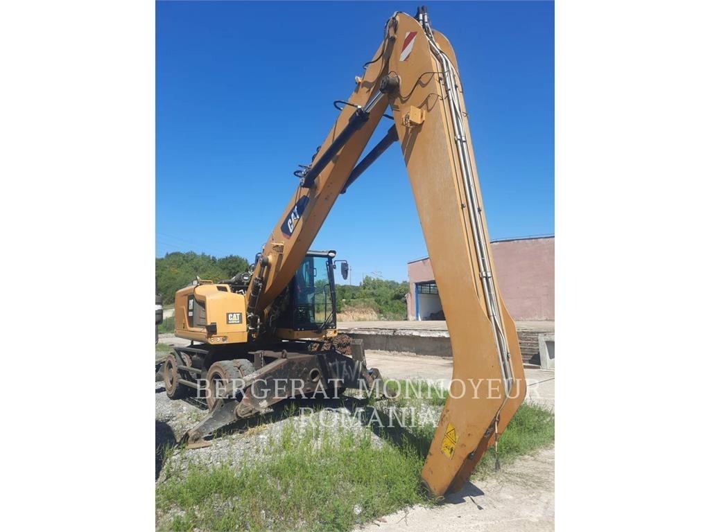 CAT MH3024-06 حفارات بعجل
