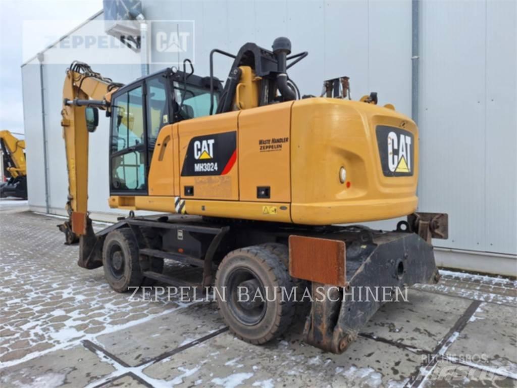 CAT MH3024-06C حفارات هدم