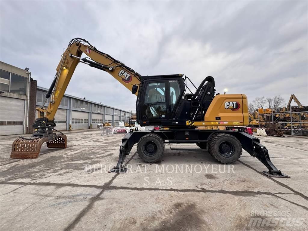 CAT MH3024-07 حفارات بعجل
